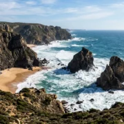 The dramatic sea stacks and cliffs of Praia da Ursa, a wild beach near Sintra