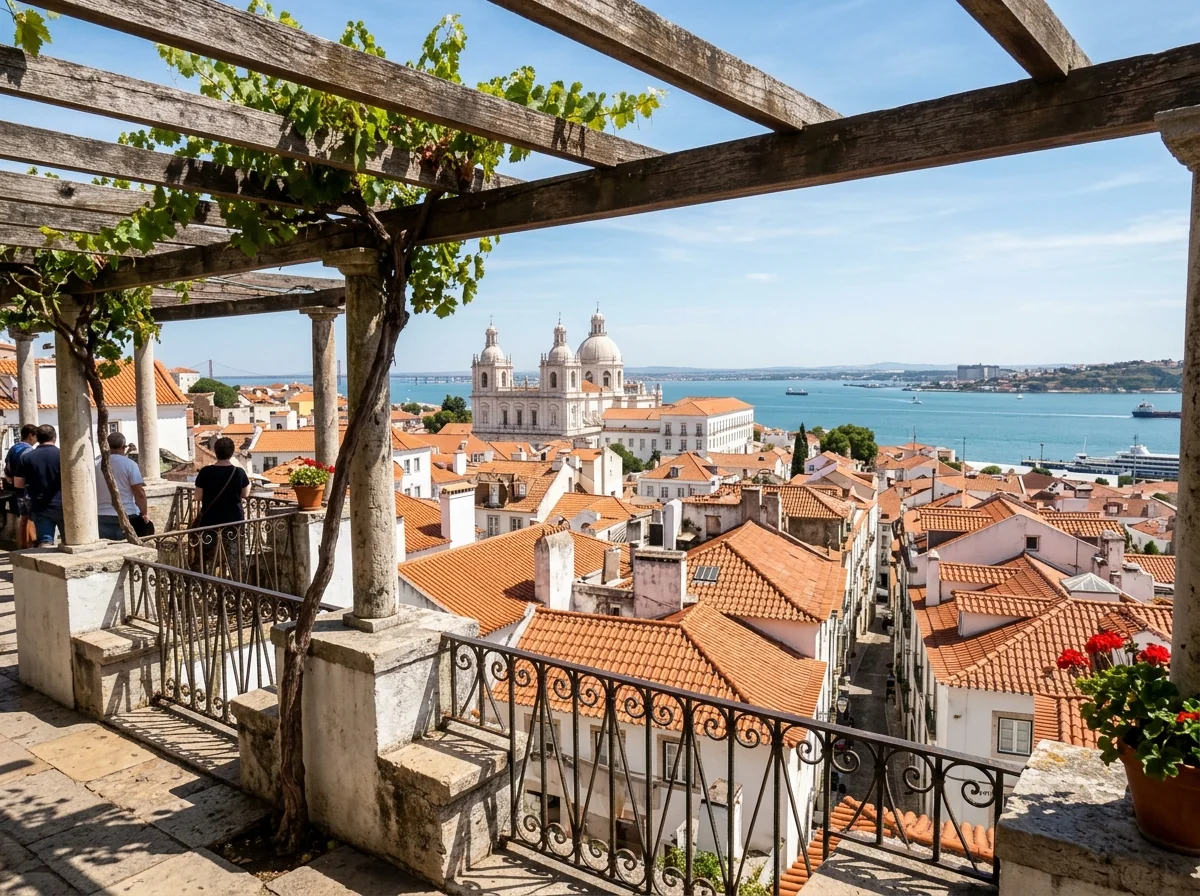 The view over Alfama's rooftops to the Tagus from a Lisbon viewpoint