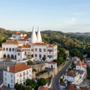 The twin white chimneys of the National Palace of Sintra above the town centre