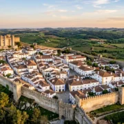 The walled town and castle of Obidos, Portugal, at golden hour